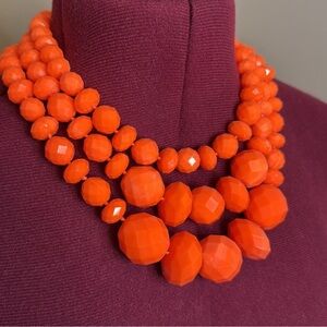 Rare Kate Spade "give it a swirl" necklace in neon orange